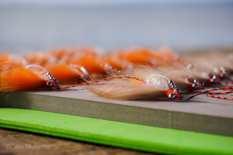Green, tan, spawning shrimp (orange) Avalons tied with a weed guard and beads on size