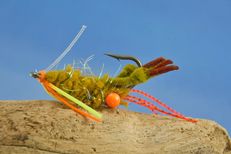 Guard Hair Chenille with contrasting rubber legs and small pearl UV micro tinsel built into a very translucent microfiber tied on Umpqua XS410 Premium Flats Hook