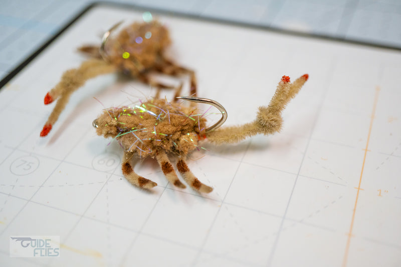 Body Guard Crab tied with tan material using a Umpqua X-Series XS410 Flats hook design has a prominent claw