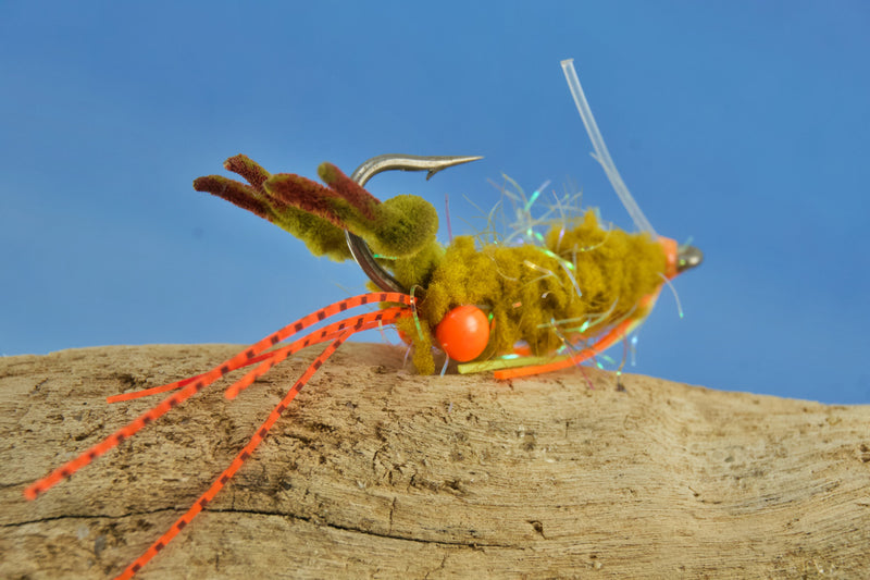 Guard Hair Chenille with contrasting rubber legs and small pearl UV micro tinsel built into a very translucent microfiber tied on Umpqua XS410 Premium Flats Hook