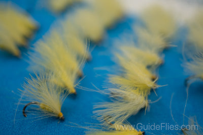 Fishing fly tied with CDC Feathers spun together for the body with matching CDC feathers for the wings