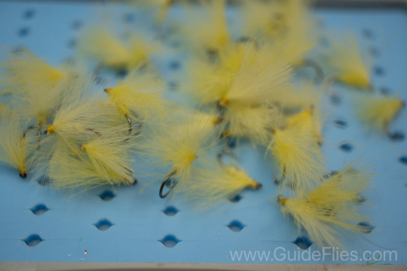 Fishing fly tied with CDC Feathers spun together for the body with matching CDC feathers for the wings