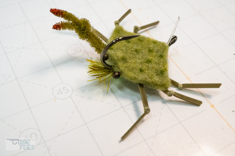 Green D-Back Crab extra heavy wire jig-hook, medium lead eyes and color-matching epoxy belly