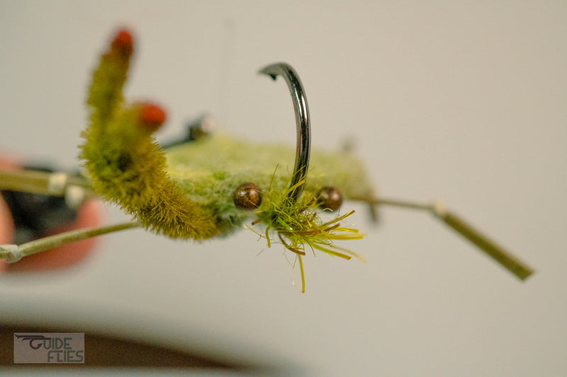 Green D-Back Crab extra heavy wire jig-hook, medium lead eyes and color-matching epoxy belly