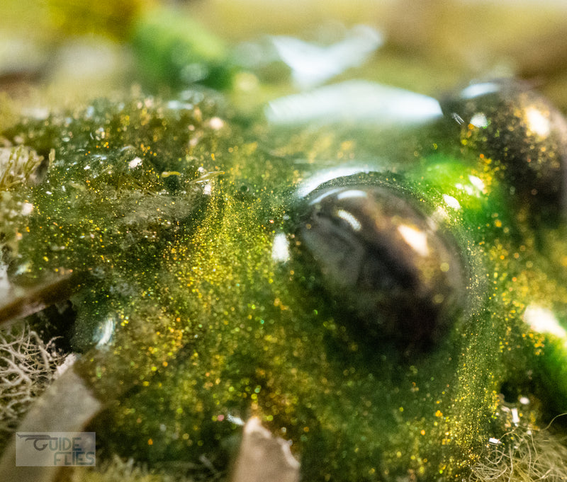 Zoom in of the medium lead eyes and color-matching epoxy belly on the green D-Back Crab