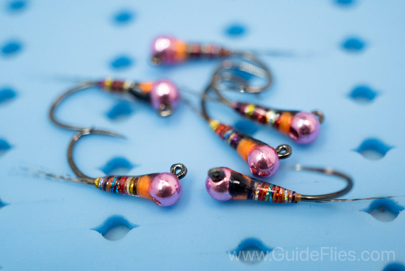 Full rainbow spectrum detailed in the dark rainbow perdigon with a epoxy resin attached to a pink tungsten bead head