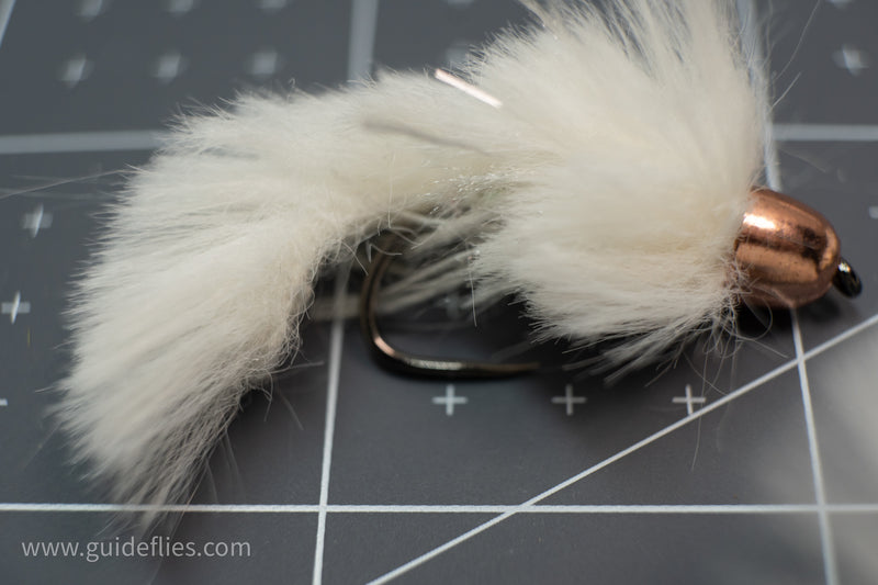 Synthetic Faux Fox Zonker designed by Dave McKenna combination of synthetic rabbit and body wrap from Semperfli tied on a Firehole barbless