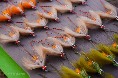 Green, tan, spawning shrimp (orange) Avalons tied with a weed guard and beads on size #2 and #4 hooks.
