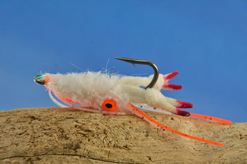 Guard Hair Chenille with contrasting rubber legs and small pearl UV micro tinsel built into a very translucent microfiber tied on Umpqua XS410 Premium Flats Hook