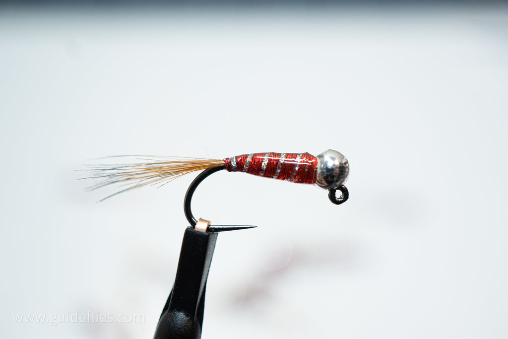 Red body with a silver rib fitted with a heavy tungsten bead