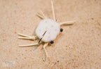 White with black dots combo crab with rubber legs and Umpqua hooks with black beaded eyes
