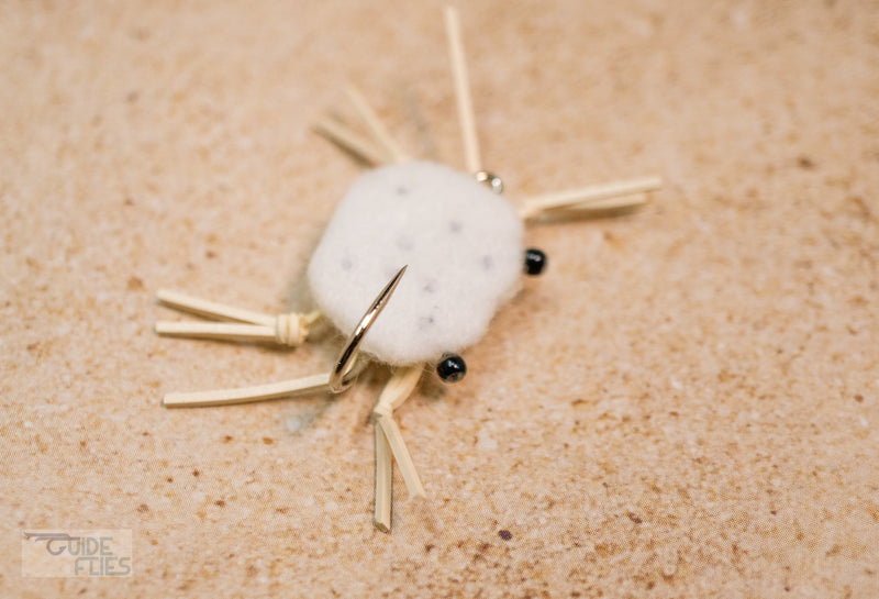 White with black dots combo crab with rubber legs and Umpqua hooks with black beaded eyes