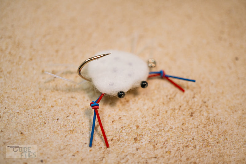 White combo crab with red and blue rubber legs and Umpqua hooks with black beaded eyes