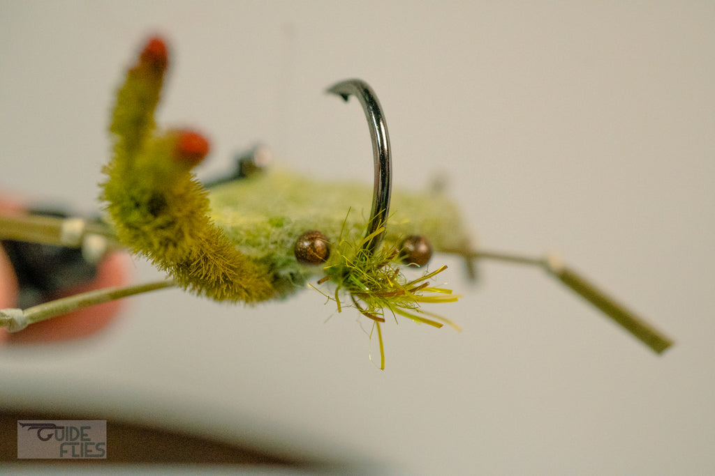Green D-Back Crab extra heavy wire jig-hook, medium lead eyes and color-matching epoxy belly