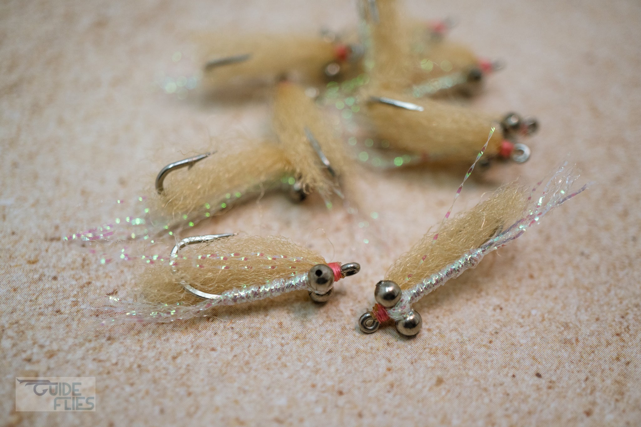This is the essential, lightweight bonefish fly that has been catching bonefish for decades. We tie our Gotcha's with minimal flash, natural shrimp tan body, and pink thread.