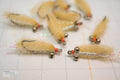 This is the essential, lightweight bonefish fly that has been catching bonefish for decades. We tie our Gotcha's with minimal flash, natural shrimp tan body, and pink thread.