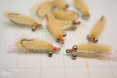 This is the essential, lightweight bonefish fly that has been catching bonefish for decades. We tie our Gotcha's with minimal flash, natural shrimp tan body, and pink thread.