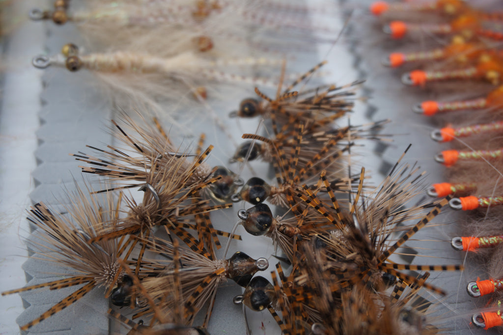natural colored resin, micro barred sili-legs, and a micro rubber-leg dubbing body provided with a weed guard!