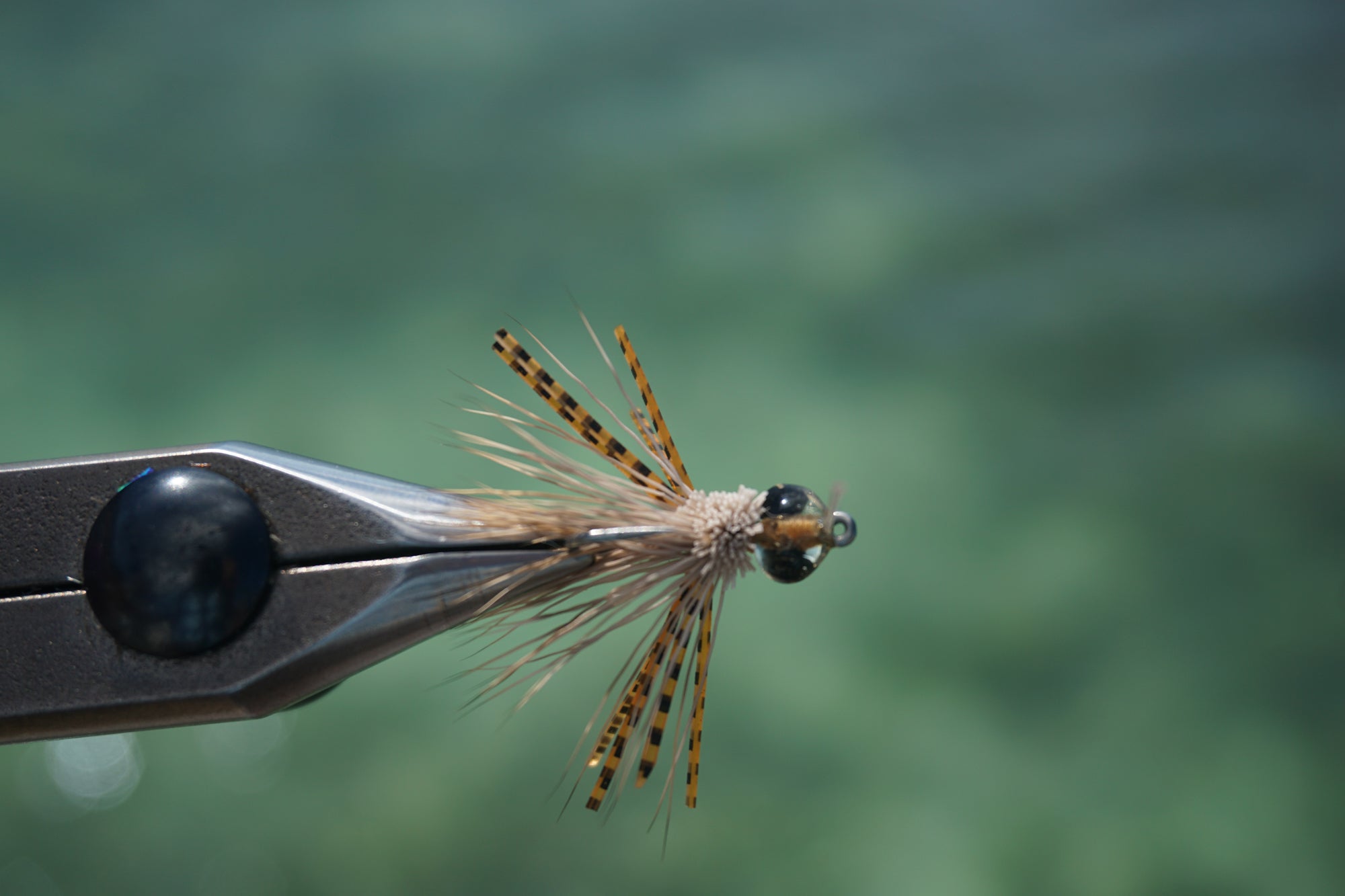 natural colored resin, micro barred sili-legs, and a micro rubber-leg dubbing body provided with a weed guard!