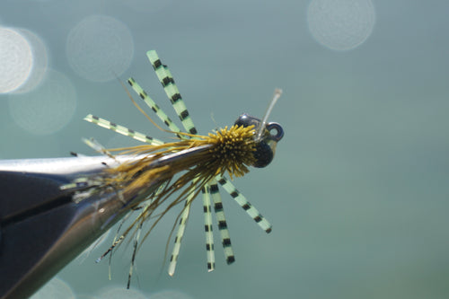 natural colored resin, micro barred sili-legs, and a micro rubber-leg dubbing body provided with a weed guard!