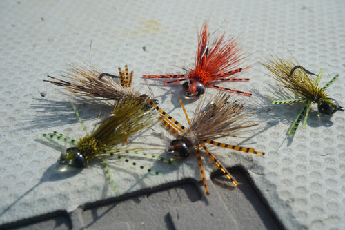 natural colored resin, micro barred sili-legs, and a micro rubber-leg dubbing body provided with a weed guard!