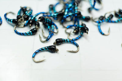 Bright blue, light blue and black make the B3 Midge with a Umpqua size #18 hook