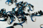 Bright blue, light blue and black make the B3 Midge with a Umpqua size #18 hook