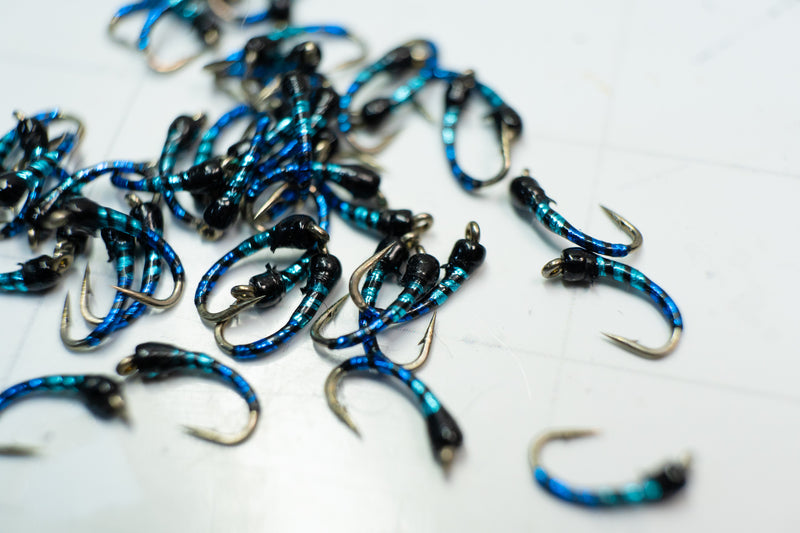 Bright blue, light blue and black make the B3 Midge with a Umpqua size 