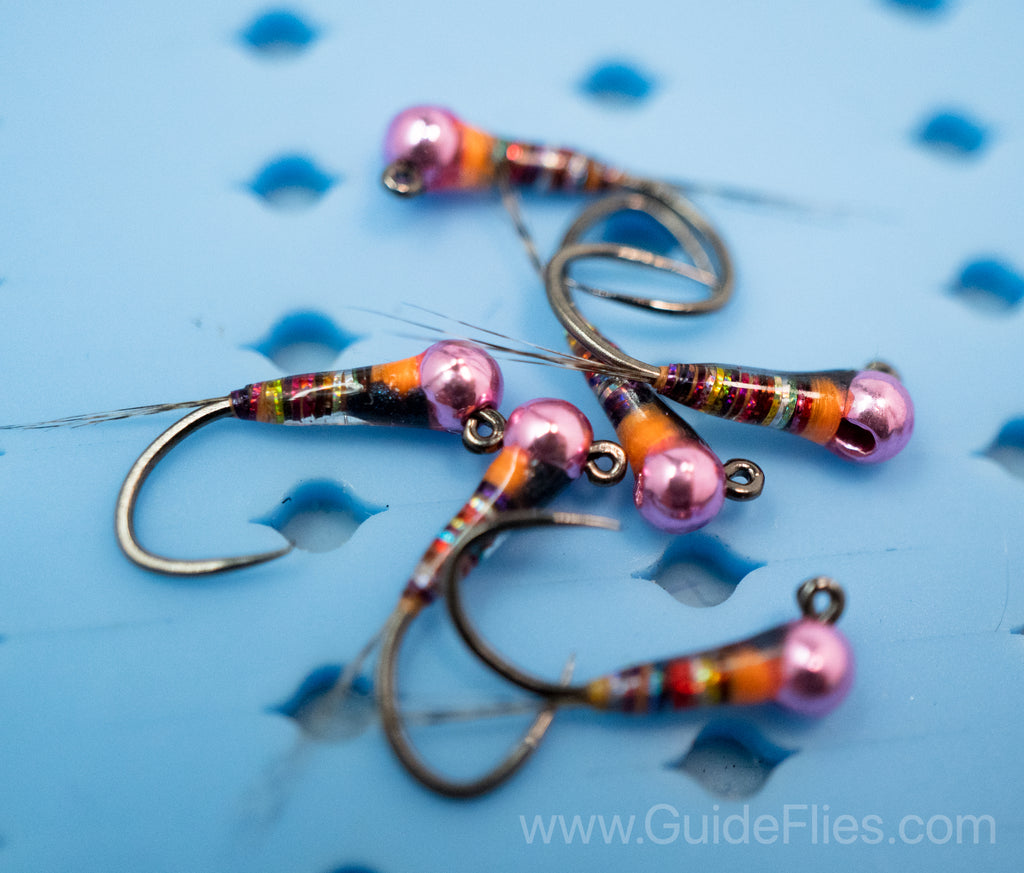 Full rainbow spectrum detailed in the dark rainbow perdigon with a epoxy resin attached to a pink tungsten bead head