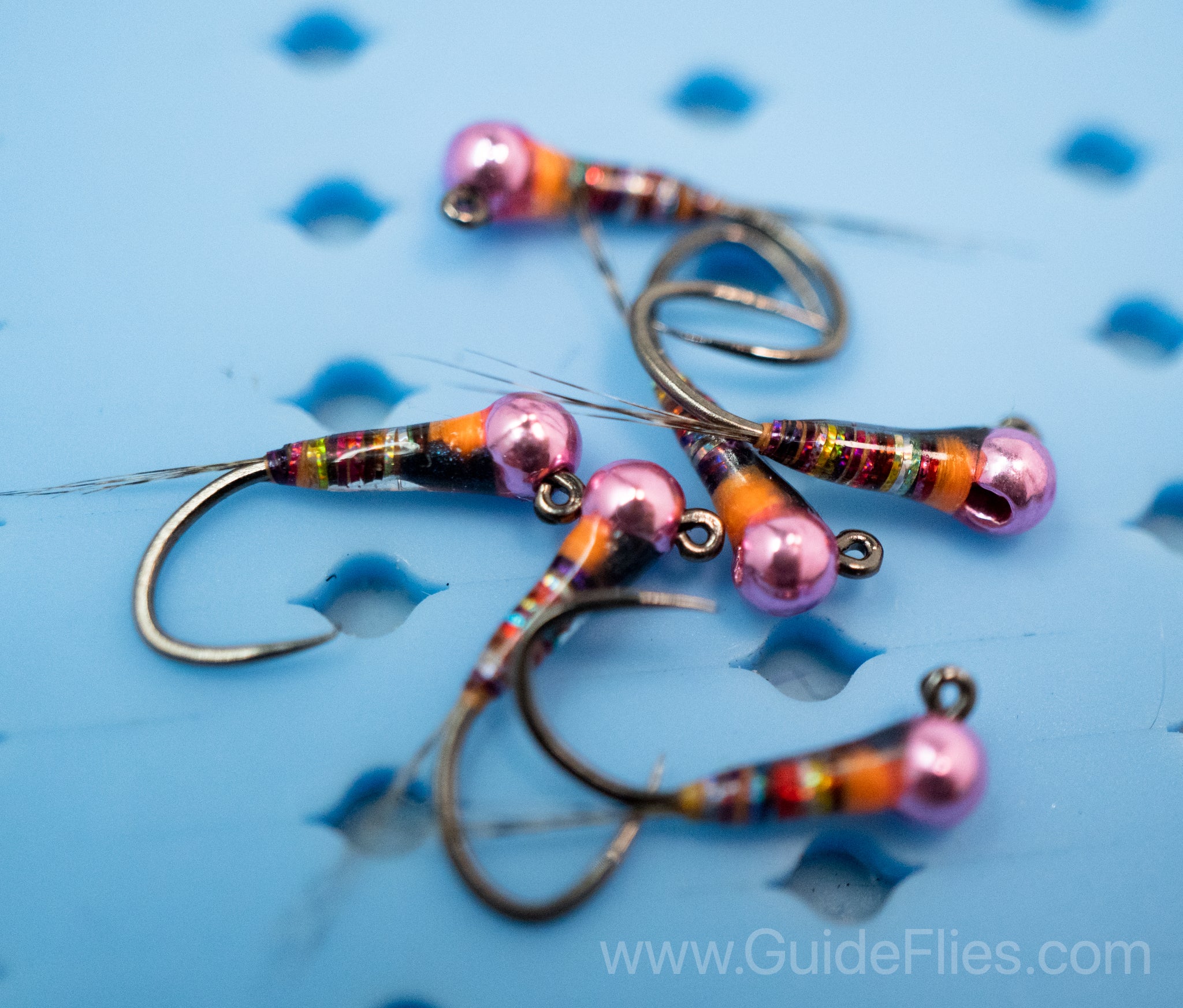 Full rainbow spectrum detailed in the dark rainbow perdigon with a epoxy resin attached to a pink tungsten bead head