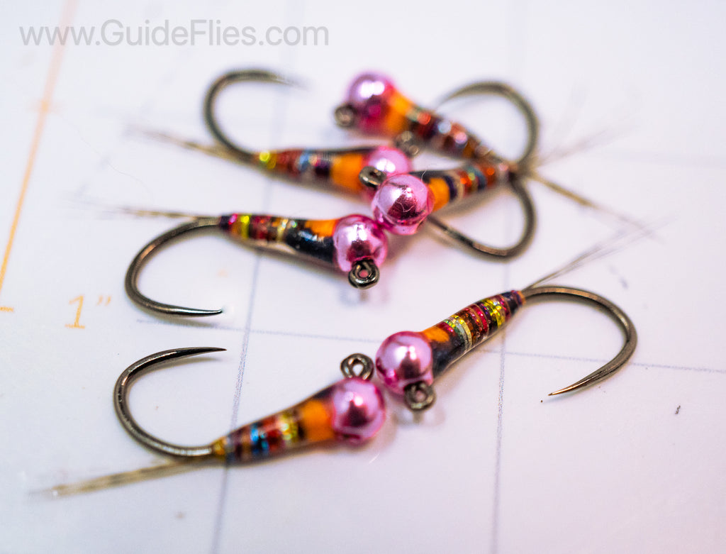 Full rainbow spectrum detailed in the dark rainbow perdigon with a epoxy resin attached to a pink tungsten bead head