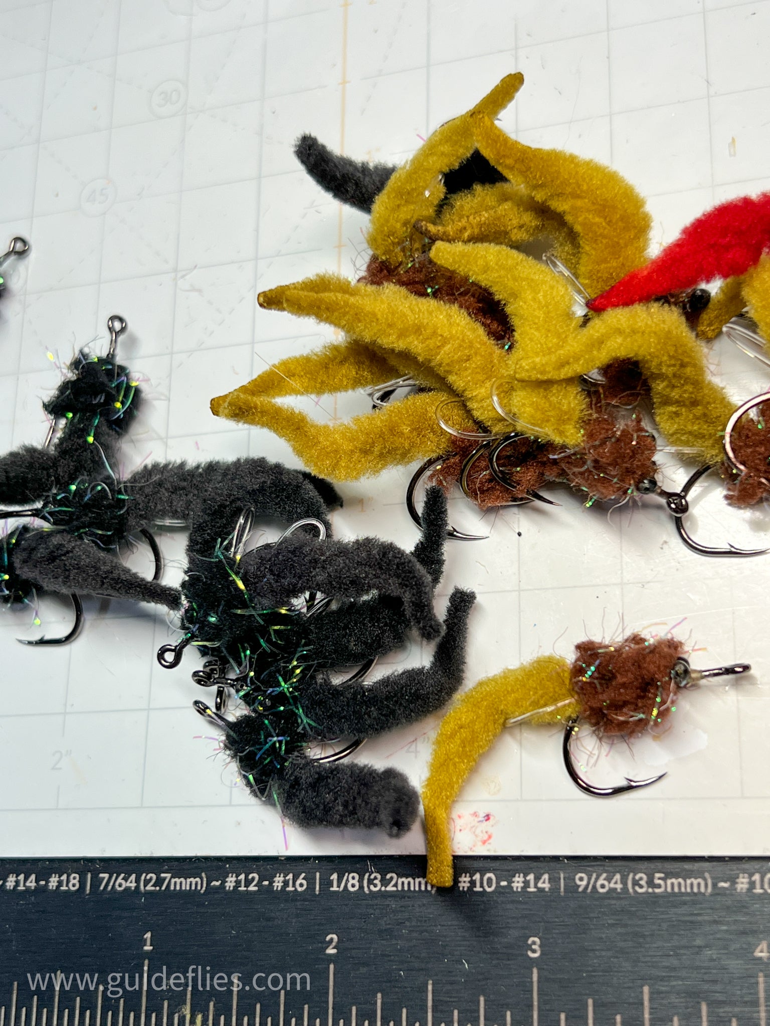 Bundle of the Dave's Tarpon worm colored black bodies and matching tails made with Guard hair chenille