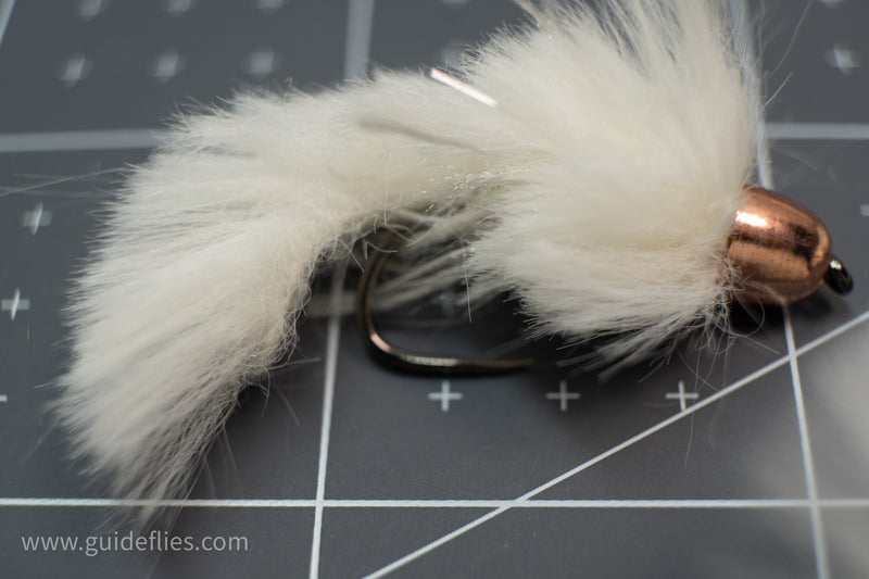 Synthetic Faux Fox Zonker designed by Dave McKenna combination of synthetic rabbit and body wrap from Semperfli tied on a Firehole barbless 
